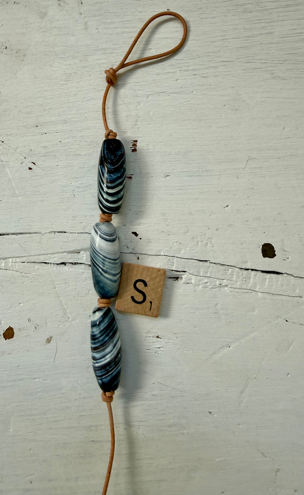 The Tidal Current handcrafted bag charm keychain