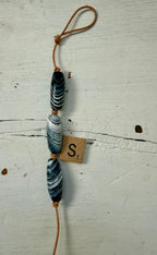 The Tidal Current handcrafted bag charm keychain