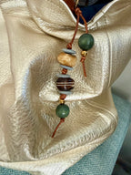 The Breakwater handcrafted bag charm keychain