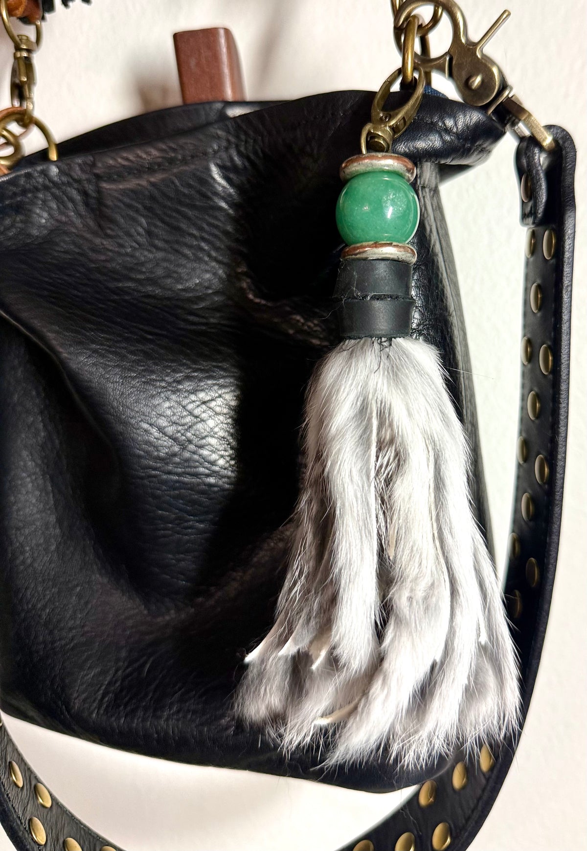 The CURIO Fur Tassel Bag Charm Purse Accessory