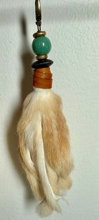 Handcrafted Blonde fur bag charm with Jade semiprecious stones and leather detailing by Chasing Sunsets Design.