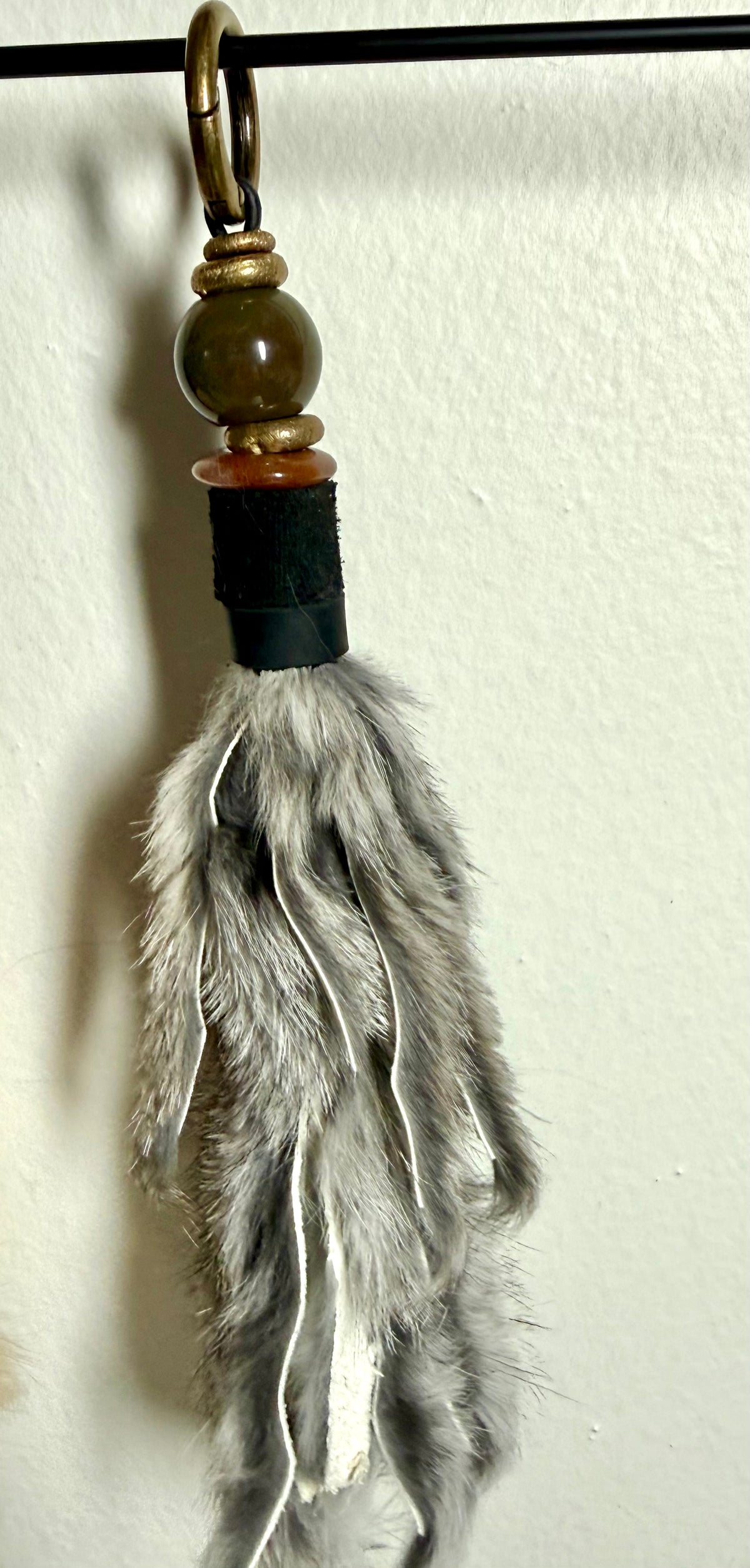 Handcrafted grey fur bag charm with Indian Agate semiprecious stones and leather detailing by Chasing Sunsets Design.