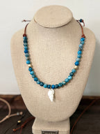 The Sapphire Sea Blue Apatite with freshwater pearl accents White Auger Shell 20 inches