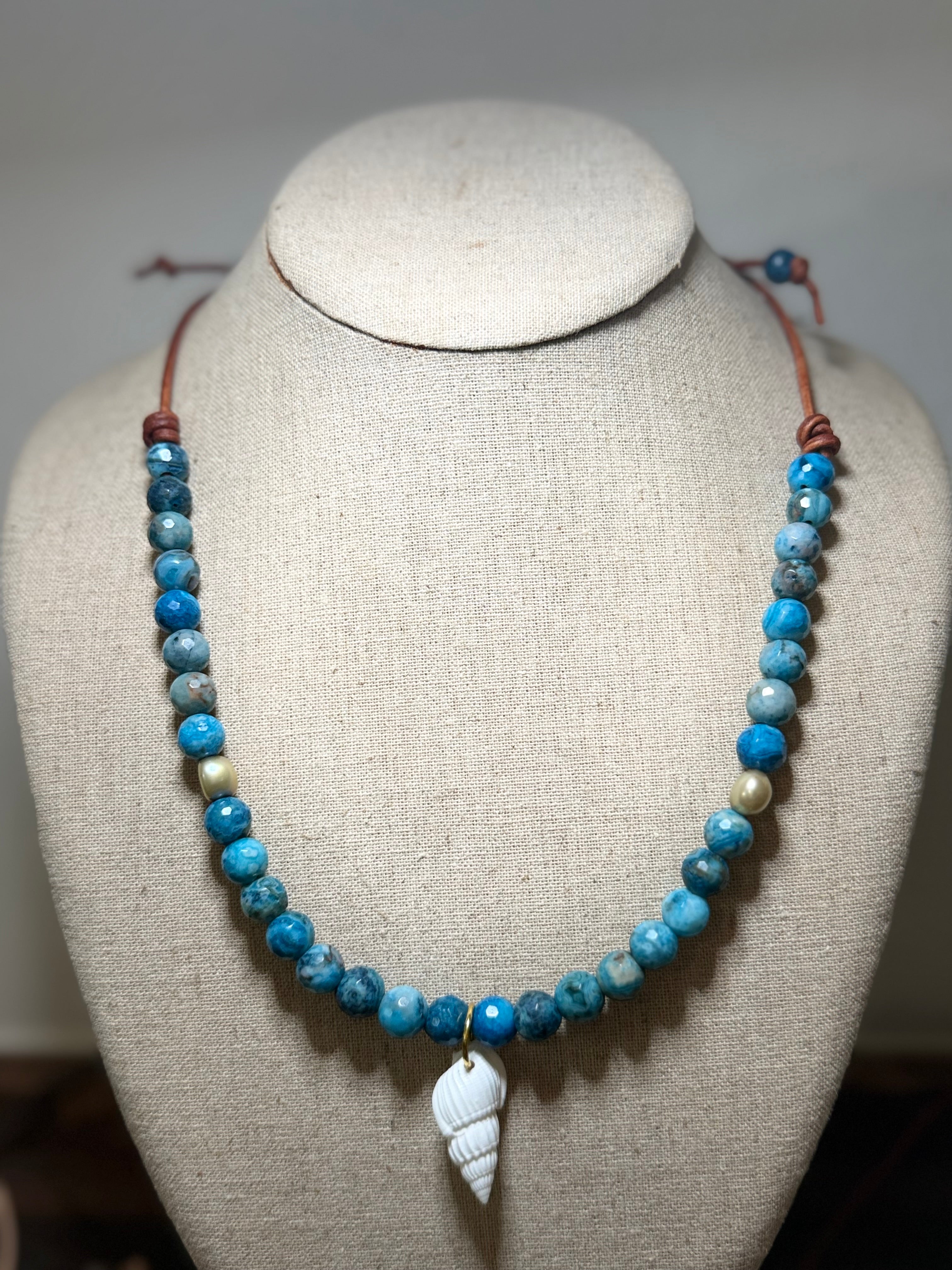 The Sapphire Sea Blue Apatite with freshwater pearl accents White Auger Shell 20 inches