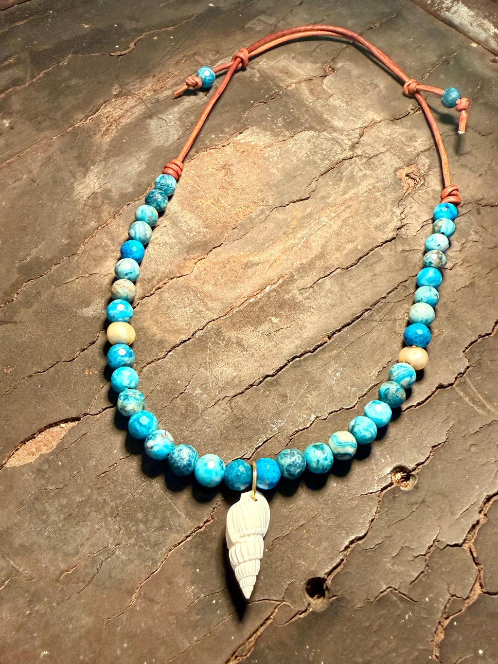The Sapphire Sea Blue Apatite with freshwater pearl accents White Auger Shell 20 inches